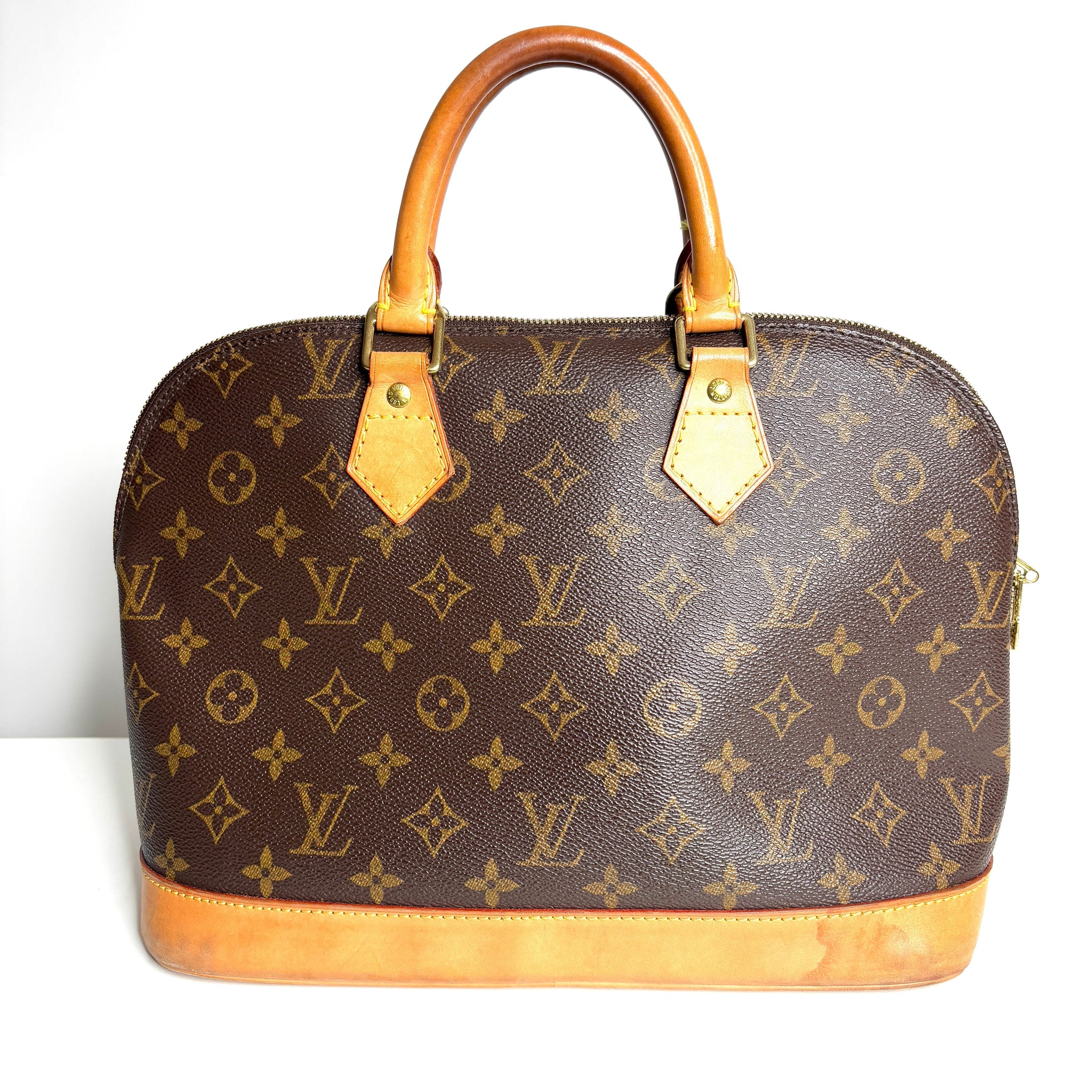 Louis Vuitton Alma PM Monogram Canvas Handbag