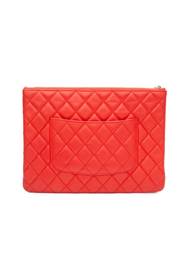 CHANEL Coral Lambskin Quilted Medium O Case Clutch