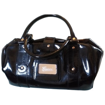 Gucci black patent leather handbag
