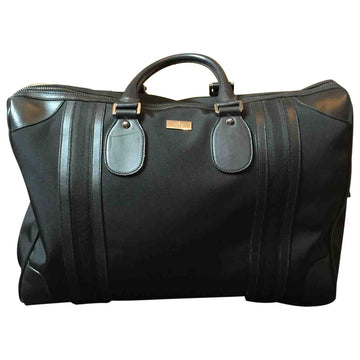 Gucci black cloth travel bag