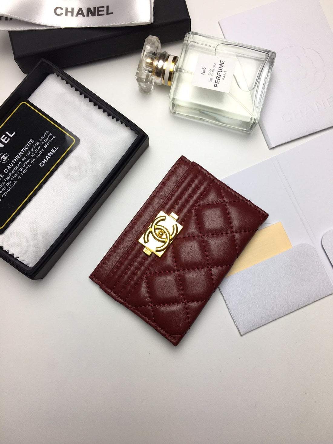 CHANEL BOY CARD HOLDER 11.2 GARNET CALFSKIN GOLD ICON