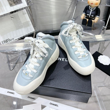 CHANEL CANO ALTO SNEAKER IN BLUE POWDER CALFSKIN AND WHITE RUBBER