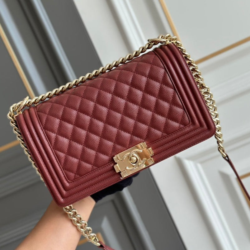 CHANEL boy medium 25 wine quilted caviar ghw