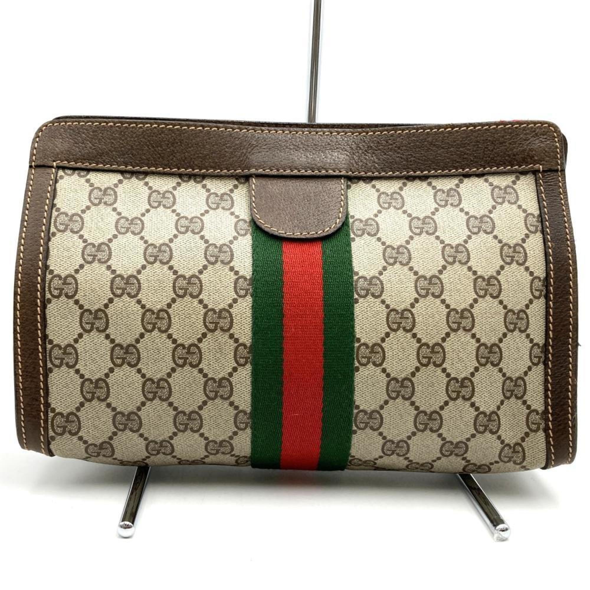 Gucci  Gg Supreme Canvas Clutch Bag