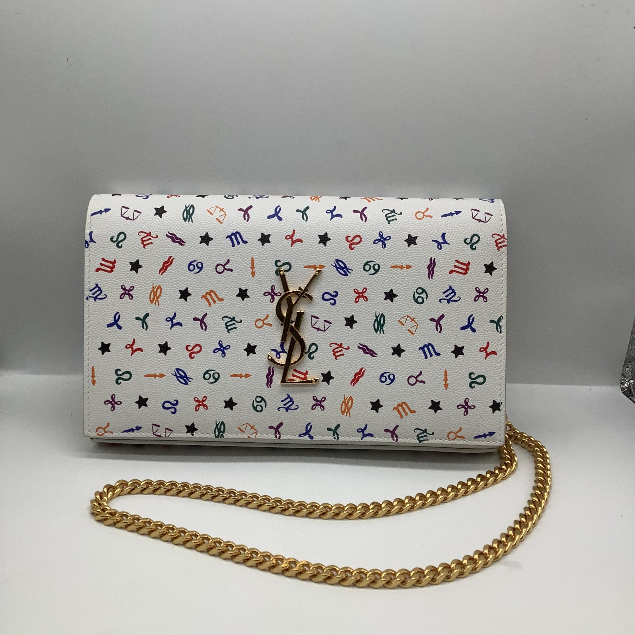 Yves Saint Laurent Zodiac Print White Clutch