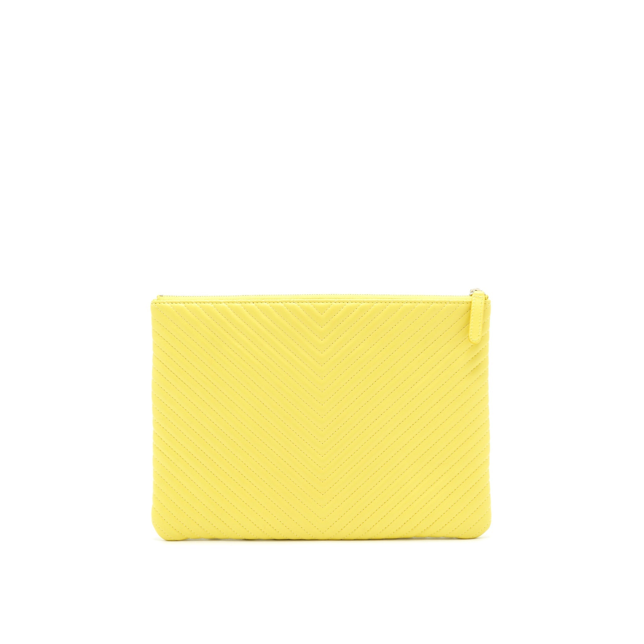 CHANEL CHEVRON CLUTCH BAG IN YELLOW SHW