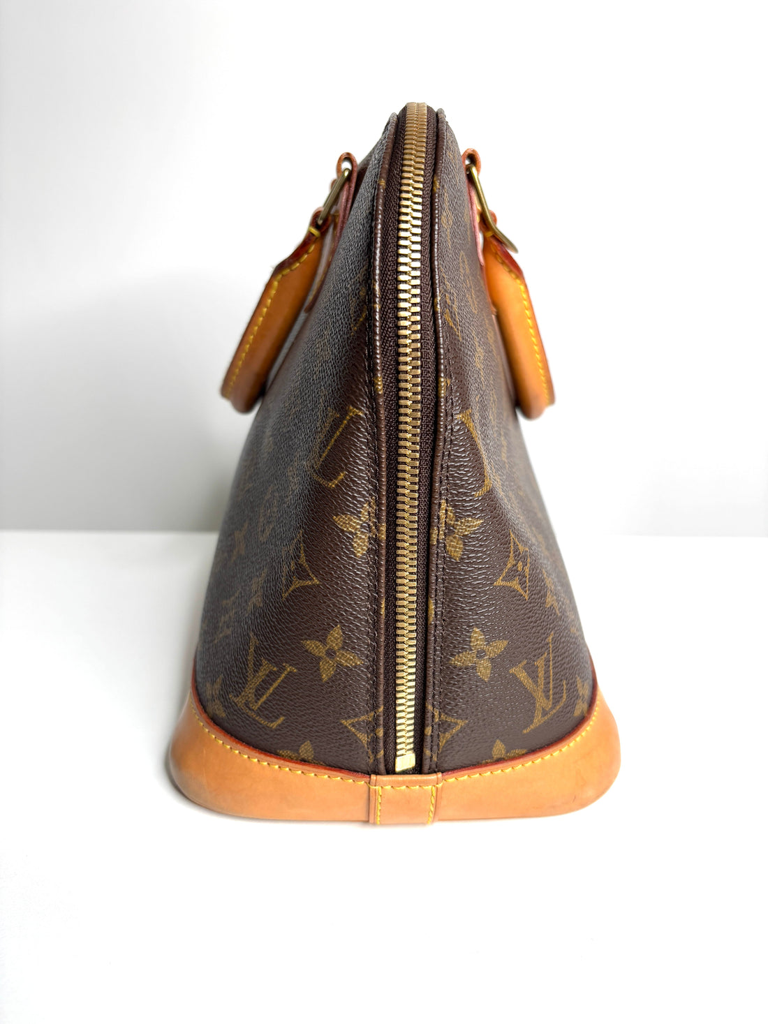 Louis Vuitton Alma PM Monogram Canvas Handbag