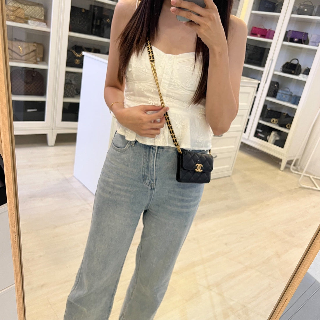 Chanel Mini Clutch on Chain in Black Caviar and AGHW