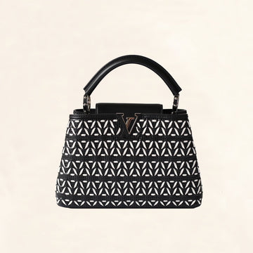 Louis Vuitton | Black and White Plaited Leather Capucines | BB