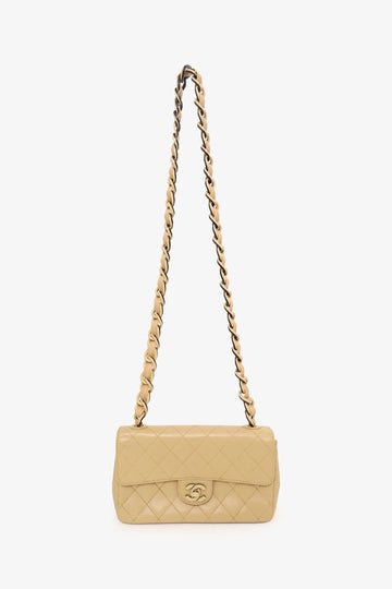 Pre-Loved Chanel™ 2000-2002 Cream Quilted Lambskin Mini Flap Bag