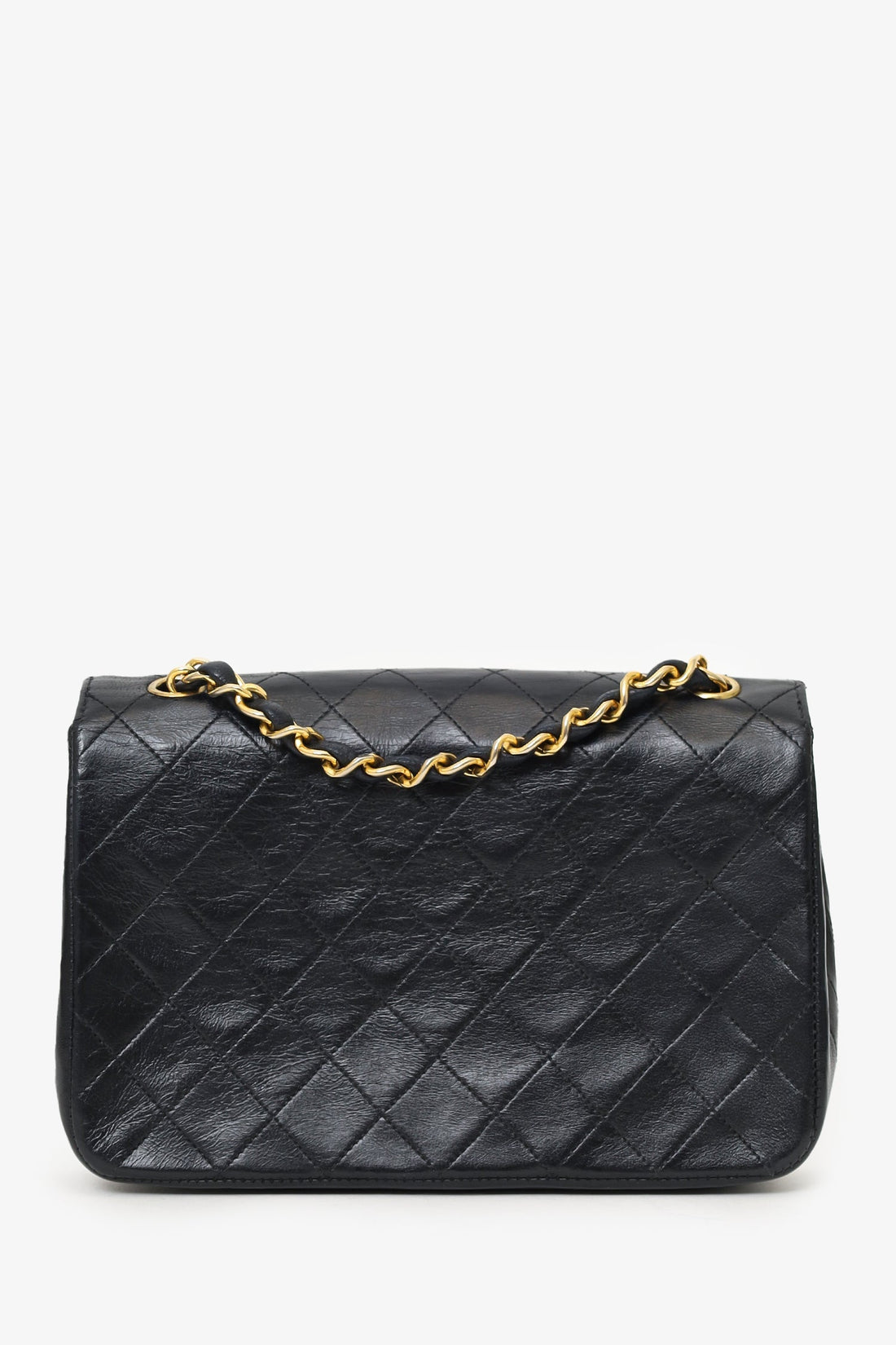 Pre-Loved Chanel™ 1986-88 Black Quilted Lambskin Circle CC Mini Flap Bag
