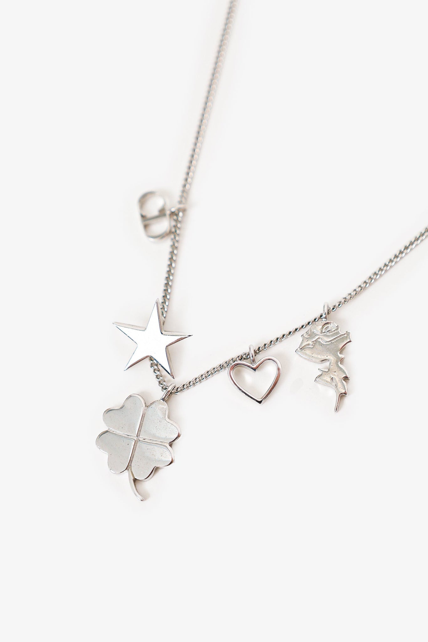 Christian Dior Silver Tone Four Leaf Clover/Star/Heart Charm Necklace