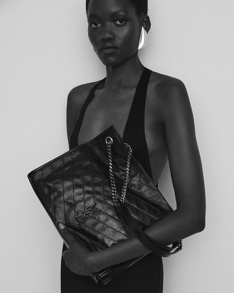 Niki Shopping In Vintage Leather