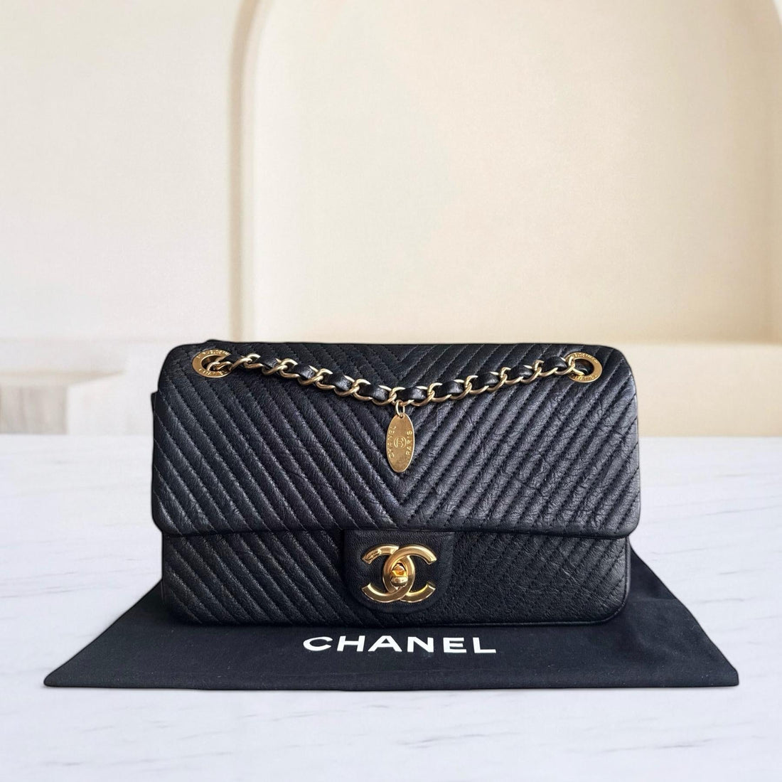 Chanel Seasonal Flap Medium - 25CM Surpique CC Herringbone Medallion Flap Chevron Goatskin Black Gold Hardware Series 21